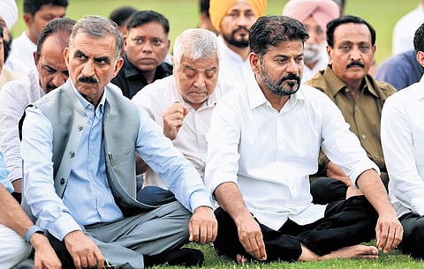 Chief Minister A Revanth Reddy participates in a protest staged by the INDIA bloc at Raj Ghat in New Delhi on Thursday