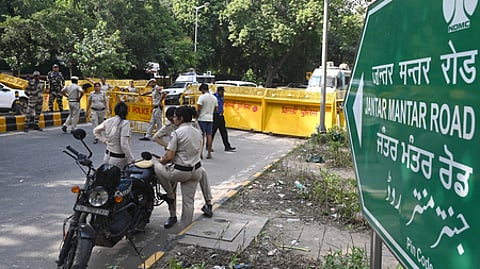 Police personnel deployed near Jantar Mantar in view of a call for protest by the Cockroach Janta Party on Saturday in New Delhi