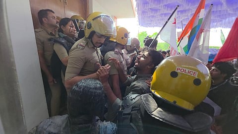 Students’ organisations, including the SFI, NSUI, MSF and AISF, clash with the police while protesting against a national seminar on Vande Mataram organised at the Central University of Kerala on Tuesday (October 6, 2026)