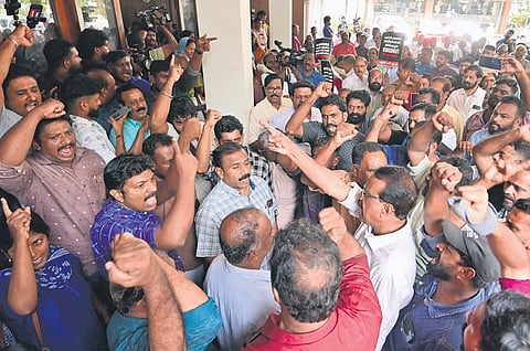 LDF activists staging protest in front of the corporation office on Friday demanding the resignation of Mayor V V Rajesh.