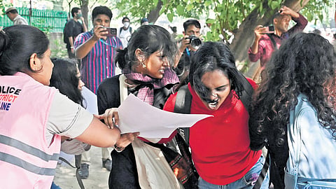 Police detain activists during a protest organised by CJP demanding the resignation of CEC Gyanesh Kumar on Saturday in Delhi.