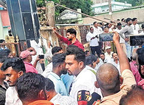 BJP and BJD workers outside Pattamundai block office on Friday.