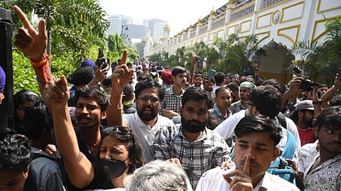 Protesters raise slogans inside Bangla Sahib Gurudwara during a protest against Chief Election Commissioner Gyanesh Kumar in New Delhi on Saturday