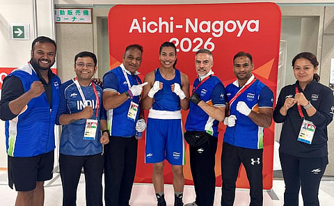 Lovlina Borgohain (c) with women's head coach Santiago Nieva (3rd from R)