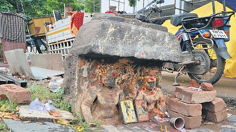 Sathikkal depicting a man and his wife found lying partially buried near the Tenkasi railway station.