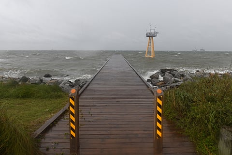 High waves generated by the effects of Isaias crash onto the empty beach on Friday, Oct. 9, 2026, in Dauphin Island, Ala.