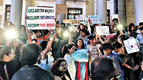 Protesters raise slogans against gender-based discrimination and concerns over women’s safety at Town Hall on Saturday.