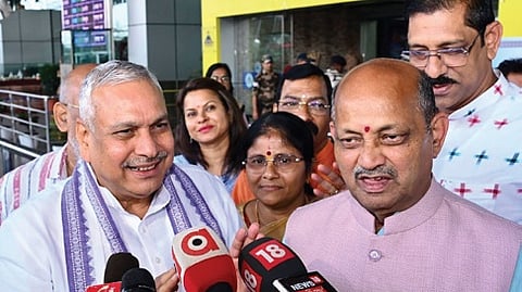 National BJP joint gen secy Saudan Singh and state president Manmohan Samal talking to mediapersons.