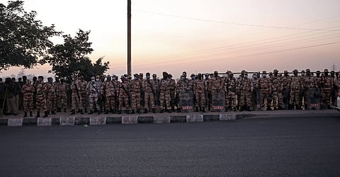 Paramilitary personnel stand guard at Nirankari Samagam Ground Burari.