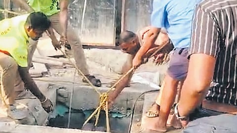 The bodies of the workers being pulled out from the well.