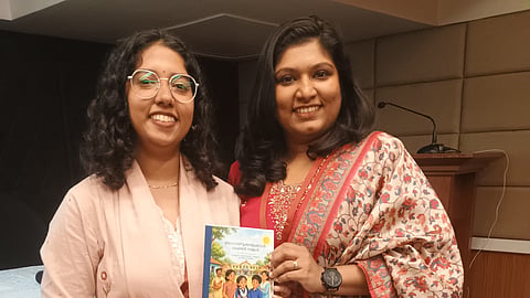 Story conceptualiser Justy Thomas (L) with illustrator Dr Ahzana K Nazarudheen with the comic book, ‘Stronger Together Than Germs’