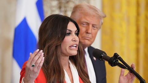 FILE - Kimberly Guilfoyle speaks as President Donald Trump listens at a reception celebrating Greek Independence Day in the East Room of the White House, March 24, 2025, in Washington.
