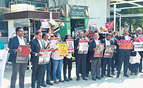 Advocates in Bengaluru raise their voice condemning police violence against protesters in New Delhi.
