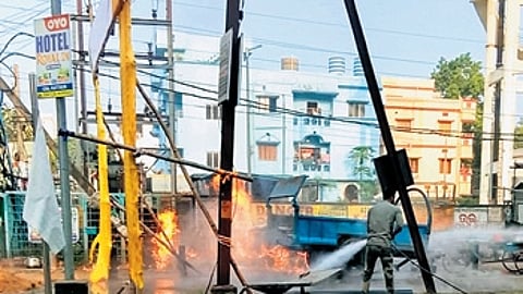 A firefighter dousing the blaze
