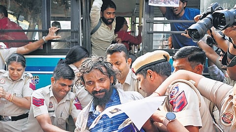 Police personnel detain members of student organisations during a protest against Chief Election Commissioner Gyanesh Kumar at Janpath on Tuesday.