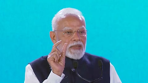 Prime Minister Narendra Modi addresses the Bloomberg New Economy Forum in New Delhi, Oct. 13, 2026.