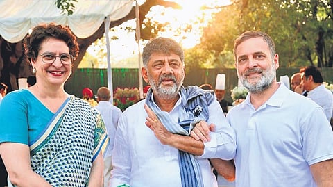 Wayanad MP Priyanka Gandhi (left), Chief Minister DK Shivakumar (centre) and LoP in Lok Sabha Rahul Gandhi in New Delhi on Tuesday.