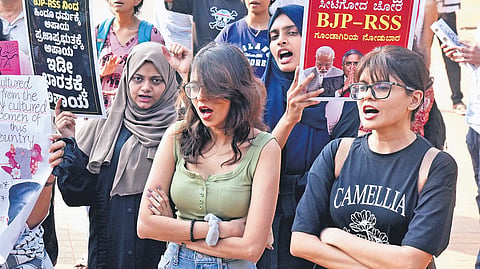 College students protest in Bengaluru on Tuesday, seeking the arrest of miscreants, allegedly from Hindu outfits, who assaulted protesters in New Delhi.