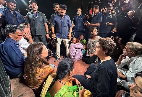 Lok Sabha LoP Rahul Gandhi and Congress MP Priyanka Gandhi Vadra join the family of Ankita Bhandari during a sit-in protest at India Gate against BJP leader Dushyant Kumar Gautam's appointment as Sikkim Governor over his alleged involvement in the 2022 Ankita Bhandari murder case, in New Delhi on Wednesday. Social activist Yogita Bhayana present.