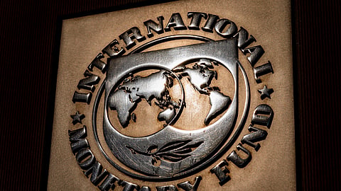 The logo of the International Monetary Fund is visible on its building, April 5, 2021, in Washington.