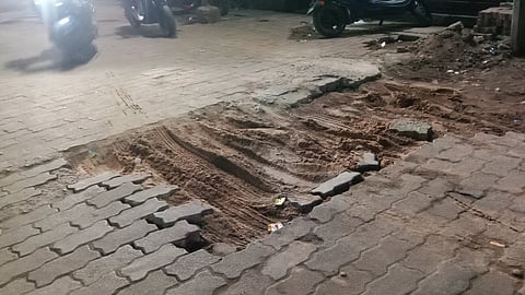 Damaged paver blocks on the road stretch from Tinikonia Bagicha to Hati Pokhari in Cuttack.