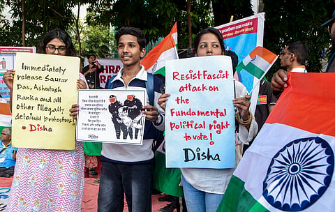 Cockroach Janta Party workers demonstrate during the 'Lehra Do Tiranga' protest at Azad Maidan against the arrest of party leaders Ashutosh Ranka and Saurav Das, in Mumbai, Maharashtra, Friday, Oct. 16, 2026.