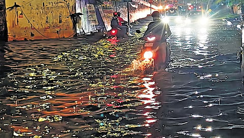 Heavy rain caused waterlogging under the Chetpet bridge on Friday, October 16, 2026.