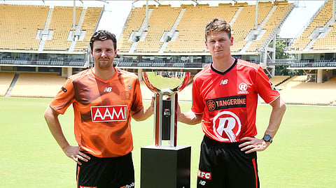 Jhye Richardson and Brendan Doggett with the BBL trophy in Chennai