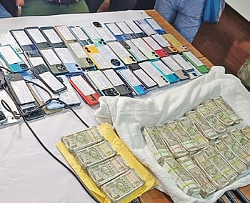 Cash and phones recovered by police