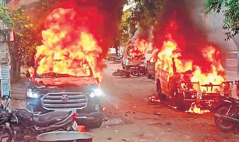Vehicles of YSRCP leaders were set on fire and vandalized at the YSRCP office in Rayachoti on Friday.