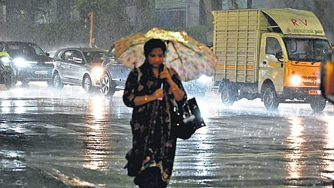 Vehicles wade through traffic amid heavy rain at Chetpet in Chennai.