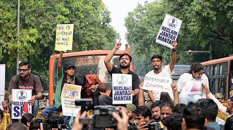 In this photo from Oct. 17, 2026, students and citizens raise slogans as they conduct a march under the banner ‘Reclaim Jantar Mantar’, demanding the resignation of Chief Election Commissioner Gyanesh Kumar, in New Delhi on Saturday.