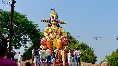 Picture of Namdev community offering prayers at the giant statue of Ravana in Khanpur area of western MP's Mandsaur district attached