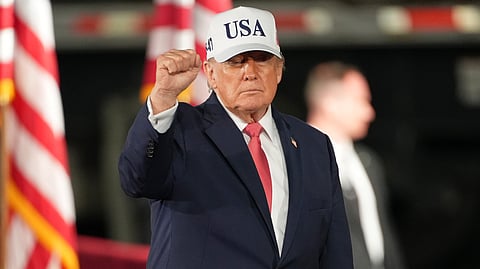 President Donald Trump gestures after speaking at a campaign rally at Pitt–Greenville Airport, Tuesday, Oct. 20, 2026, in Greenville, N.C.