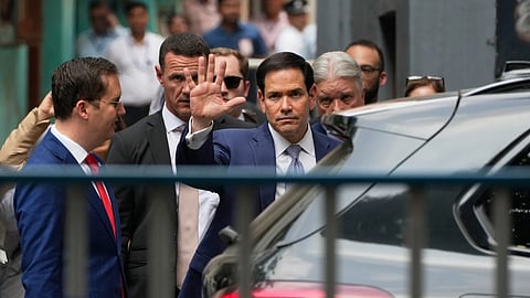 US Secretary of State Marco Rubio waving at media personnel as he comes out after a visit at Mother House in Kolkata on Saturday