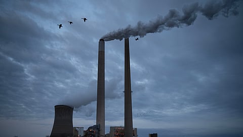 The coal-fired Mountaineer Power Plant, near New Haven, W.Va., operates across the Ohio River from the Lock 24 RV Park and Campground in Racine, Ohio, March 13, 2026