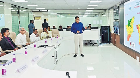 Additional Chief Secretary Dr B Chandra Mohan explains preparatory measures to Chief Minister C Joseph Vijay at the SEOC in Ezhilagam on Thursday.
