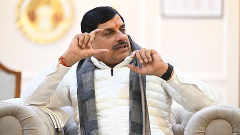 Madhya Pradesh Chief Minister Mohan Yadav gestures during an interview in Bhopal on December 13, 2024.