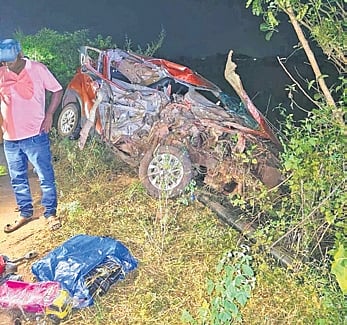 The mangled remains of a car that rammed against a truck on state highway-10A near Kaleiposh in Sundargarh district
