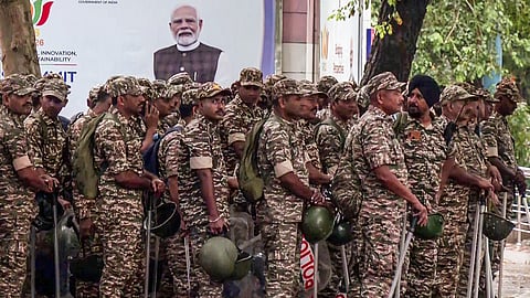 In this photo from Oct. 12, 2026, security personnel deployed at Connaught Place in New Delhi.