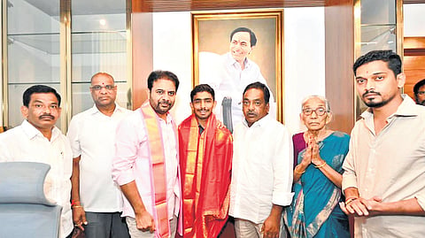 BRS working president KT Rama Rao felicitates Duggidevara Sri Raghunandan for adopting the government primary school at Mallavaram village in Tallada mandal of Khammam district, at Hyderabad on Saturday