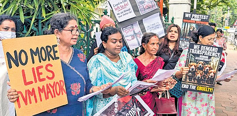 Activists of People for Animals stage protest in front of the Thiruvananthapuram city corporation office on Saturday, demanding clarity on the alleged irregularities related to the stray dog shelter