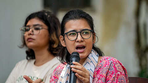 All India Students' Association (AISA) National President Neha Bora, with others, addresses a press conference at the CPI(ML) Liberation Parliamentary Office in New Delhi, Saturday, Oct. 24, 2026.