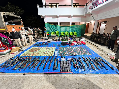 Twenty-four firearms, 38 magazines, a large quantity of ammunition, explosives, wireless communication equipment and other combat gear were seized.