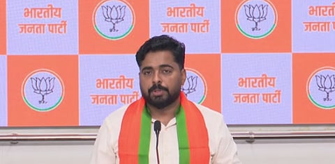 BJP chief spokesperson Navnath Ban addressing a press conference.