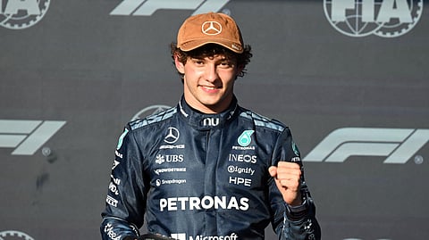 Mercedes' Italian driver Kimi Antonelli celebrates after winning the pole position during the qualifying session for the United States Formula One Grand Prix at the Circuit of the Americas in Austin, Texas, on October 24, 2026.