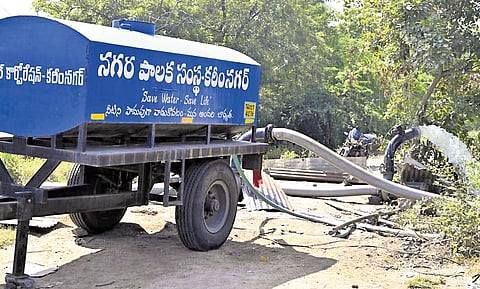 A Teegalaguttapally farmer pumps stagnant canal water into tankers on Sunday to irrigate his drying paddy fields and save crops amid severe water shortage