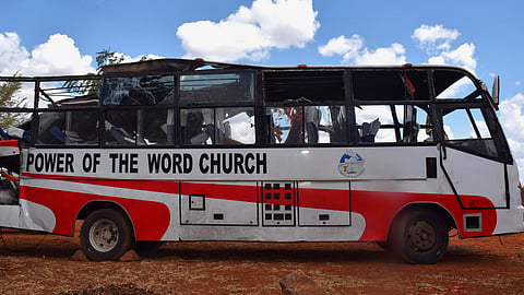 A bus involved in a fatal collision with a truck along the Nairobi-Mombasa Highway is parked at a police station in Makueni County, Kenya, Sunday, Oct. 25, 2026.