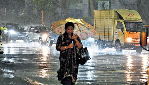 Motorists, commuters pass through waterlogged roads amid rain in Chetpet