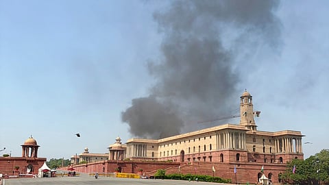 Smoke billowing into the sky in Delhi's North Block.